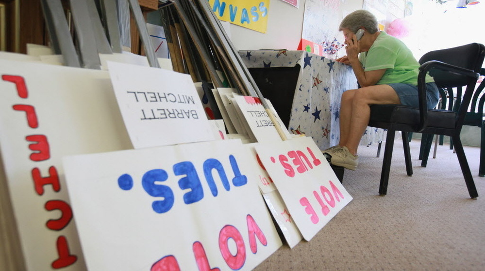 Getting out the vote: In Janesville, Wis., on Monday, Democrat Wanda Sonnentag was calling voters.