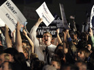 Supporters of Republican Gov. Scott Walker watch returns as they await the governor's speech at an election night rally on Tuesday in Waukesha, Wis. Walker survived a recall election in the state, defeating his Democratic rival, Tom Barrett. Supporters of Republican Gov. Scott Walker watch returns as they await the governor's speech at an election night rally on Tuesday in Waukesha, Wis. Walker survived a recall election in the state, defeating his Democratic rival, Tom Barrett.