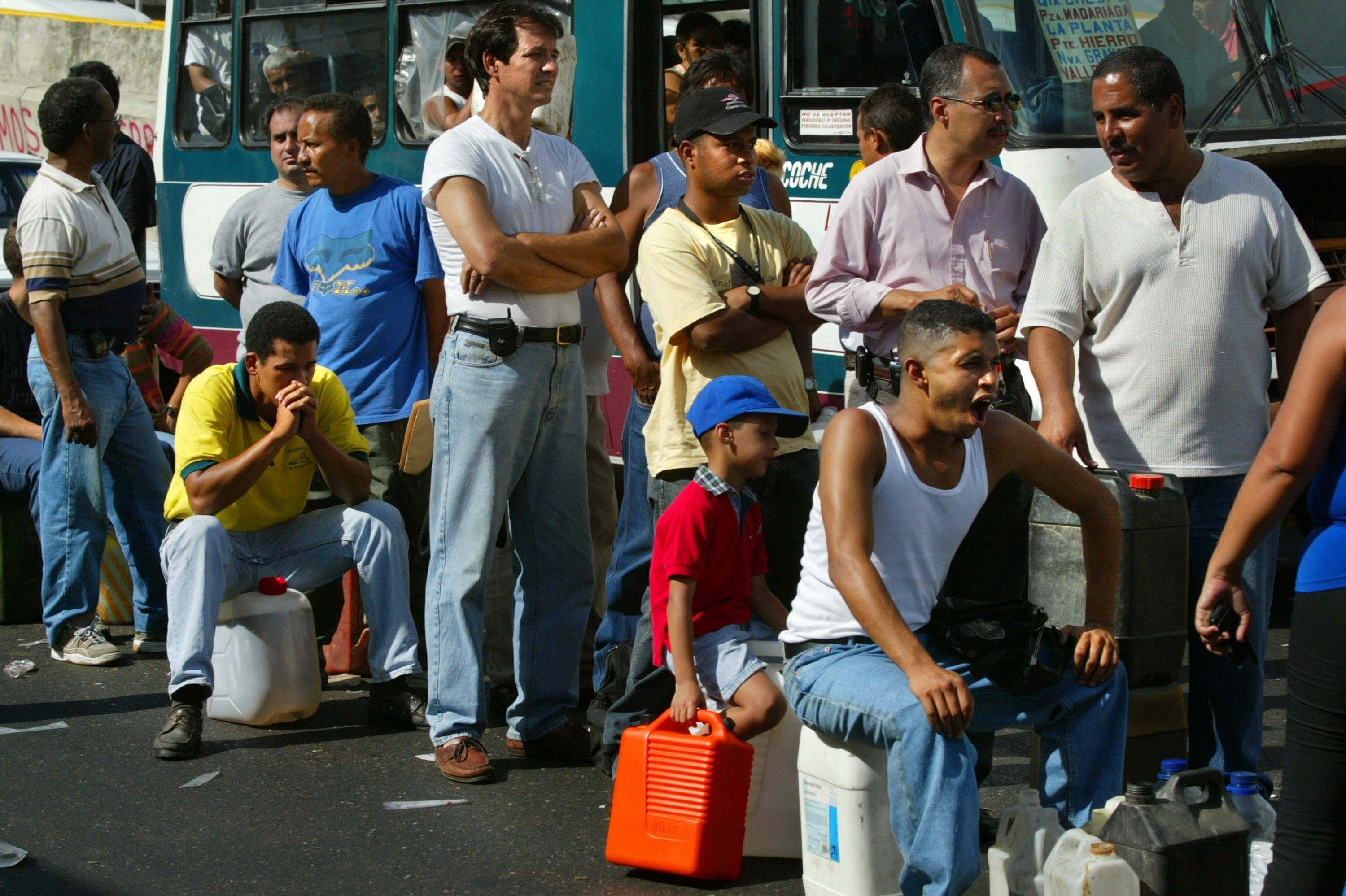 Venezuelans wait for hours in gas lines in Caracas on Dec. 21, 2002, the 20th day of a general strike protesting Chavez's rule. The strike temporarily crippled Venezuela's vital oil industry.