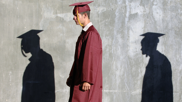 Columbia High School graduates walk to their commencement ceremony in Nampa, Idaho. A new Rutgers University study says nearly half of recent high school graduates are still looking for full-time work.