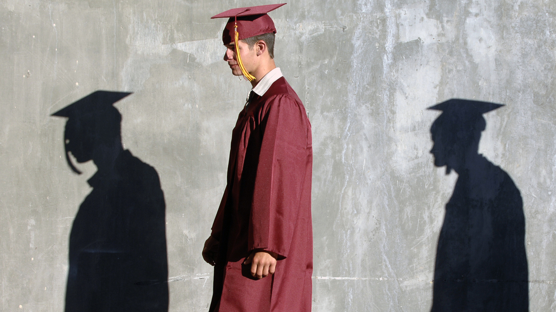 Columbia High School graduates walk to their commencement ceremony in Nampa, Idaho. A new Rutgers University study says nearly half of recent high school graduates are still looking for full-time work.