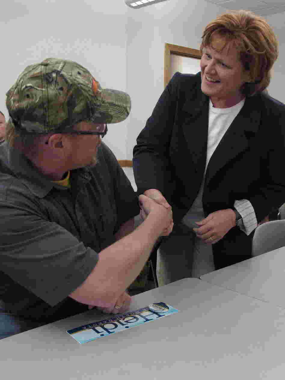 Democratic Senate candidate Heidi Heitkamp greets a supporter before a town hall meeting in Minot, N.D., on May 3.