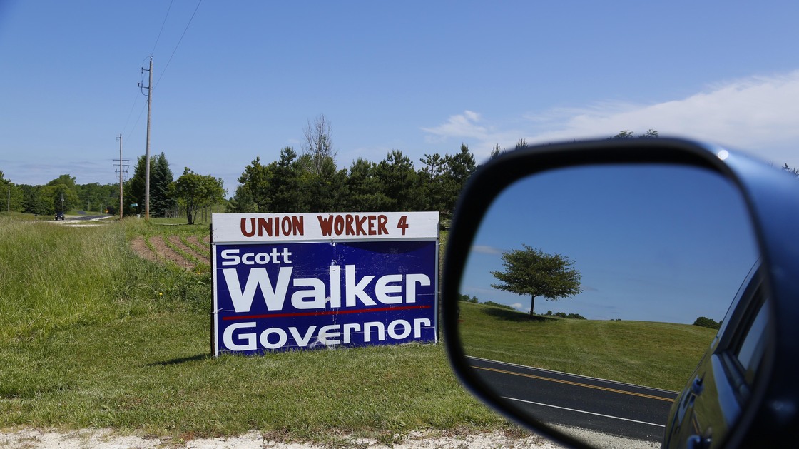 A sign along a county highway in Saukville, Wis. Exit polls showed 38 percent of voters with a labor union member in the family voted for Republican Gov. Scott Walker.