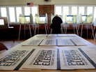 A voter marks her ballot in the California primary in Sacramento on Tuesday. A voter marks her ballot in the California primary in Sacramento on Tuesday.