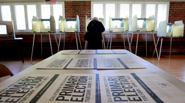 A voter marks her ballot in the California primary in Sacramento on Tuesday.
