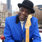 "I didn't learn nothing from a book," Buddy Guy tells NPR's Neal Conan. "I learned by ... being quiet, keep your ears open and listen."