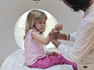 Isabel Doran, 4, gets a CT scan at Children's National Medical Center with her mom, Veronica Doran. The X-ray radiation in CT scans raises the risks for cancer, including leukemia, a new study shows. Isabel Doran, 4, gets a CT scan at Children's National Medical Center with her mom, Veronica Doran. The X-ray radiation in CT scans raises the risks for cancer, including leukemia, a new study shows.