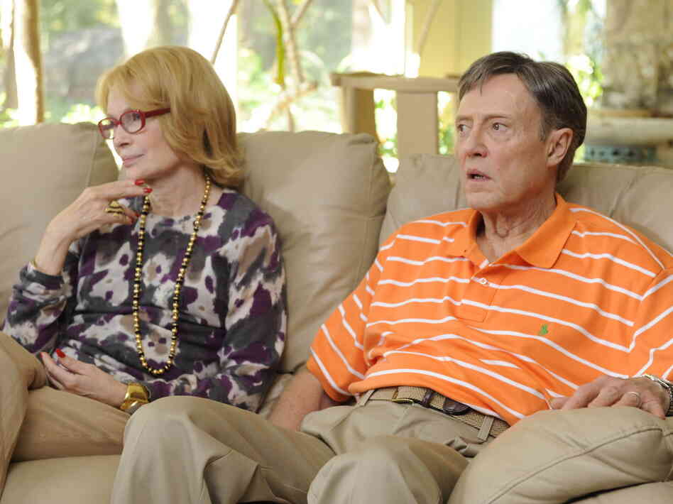 Mia Farrow and Christopher Walken play Phyllis and Jackie, Abe's parents and — in Jackie's case — his employer.