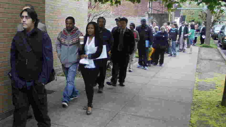 Job seekers lined up at a jobs fair in Portland, Ore., earlier this year.