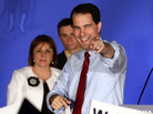 Wisconsin Republican Gov. Scott Walker (right) celebrates his win over Democratic challenger Tom Barrett at Tuesday night's victory party in Waukesha, Wis. Wisconsin Republican Gov. Scott Walker (right) celebrates his win over Democratic challenger Tom Barrett at Tuesday night's victory party in Waukesha, Wis.