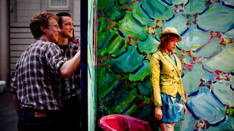 A thin wall separates the real and painted worlds. A thin wall separates the real and painted worlds.