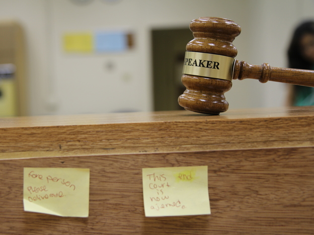 A gavel rests in a makeshift courtroom at Richmond High School in Richmond, Calif. The  local school district has cut the number of student suspensions in half in six years by adopting a youth court program and other new discipline methods.