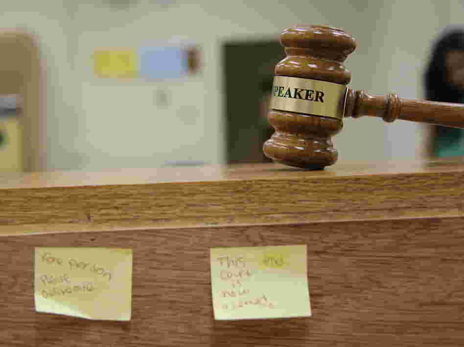 A gavel rests in a makeshift courtroom at Richmond High School in Richmond, Calif. The  local school district has cut the number of student suspensions in half in six years by adopting a youth court program and other new discipline methods.