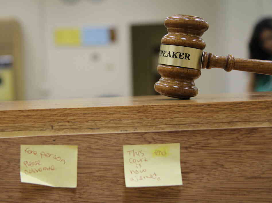 A gavel rests in a makeshift courtroom at Richmond High School in Richmond, Calif. The  local school district has cut the number of student suspensions in half in six years by adopting a youth court program and other new discipline methods.