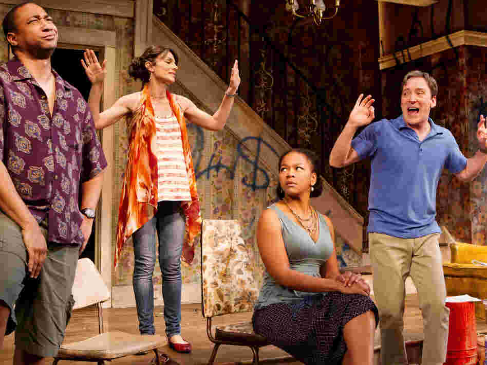 From left, Damon Gupton, Annie Parisse, Crystal A. Dickinson and Jeremy Shamos in a scene from Clybourne Park's second act, set in a gentrifying neighborhood. 