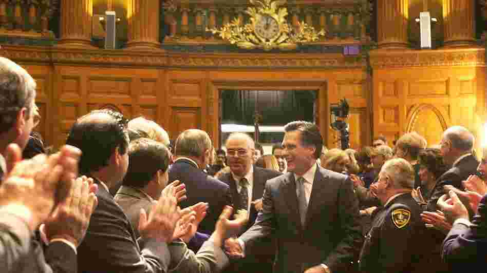 Mitt Romney, then the governor-elect of Massachusetts, walks into the House chambers during inaugural ceremonies at the Statehouse in Boston, on Jan. 2, 2003.