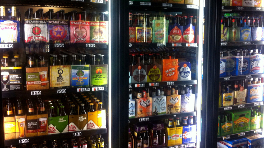 Craft brewers are reaching markets far from their home breweries. In a Washington, D.C., store, beers from California, Colorado, Louisiana, Vermont, and elsewhere are for sale.