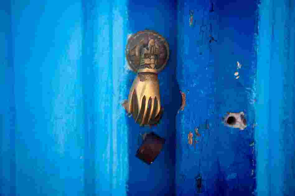 The real Kairouan is a Muslim holy city, was an early foothold for Islam as it spread across North Africa. Most of the door knockers in old-town Kairouan are in the shape of a hand. It symbolizes the hand of the prophet Mohamed's daughter Fatma.