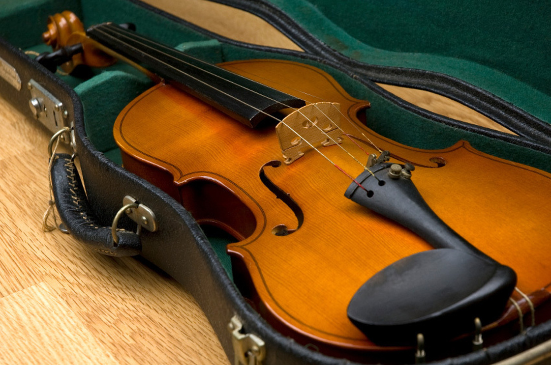 Recent revisions to British Airways' carry-on luggage rules can confuse travelers with musical instruments.