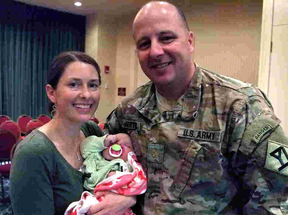 Maj. Matthew Porter, his wife, Jennifer, and their 3-month-old daughter attended the Yellow Ribbon event. They say the deployment strained their relationship, but they are working to keep their marriage healthy.