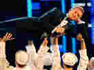 Neil Patrick Harris performs at the 2011 Tony Awards in June of last year. He will host again Sunday night.