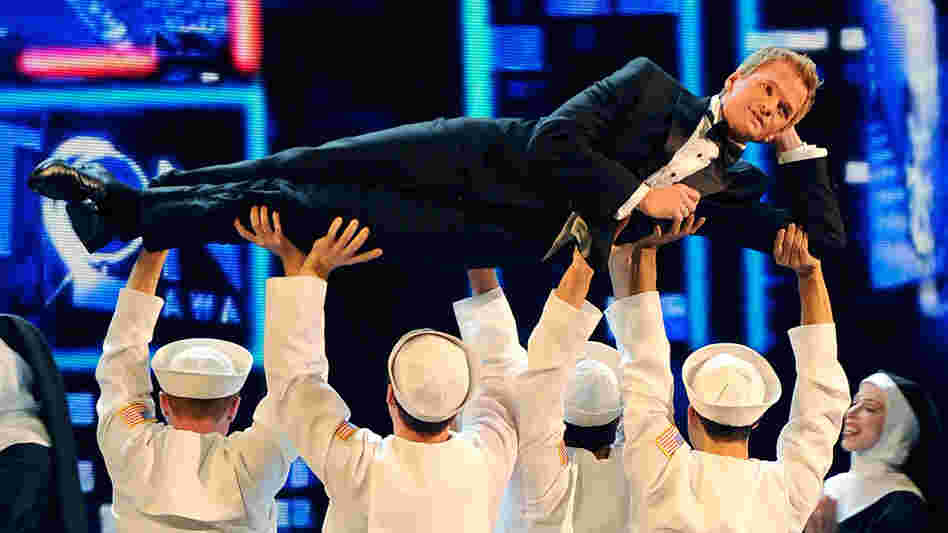 Neil Patrick Harris performs at the 2011 Tony Awards in June of last year. He will host again Sunday night.