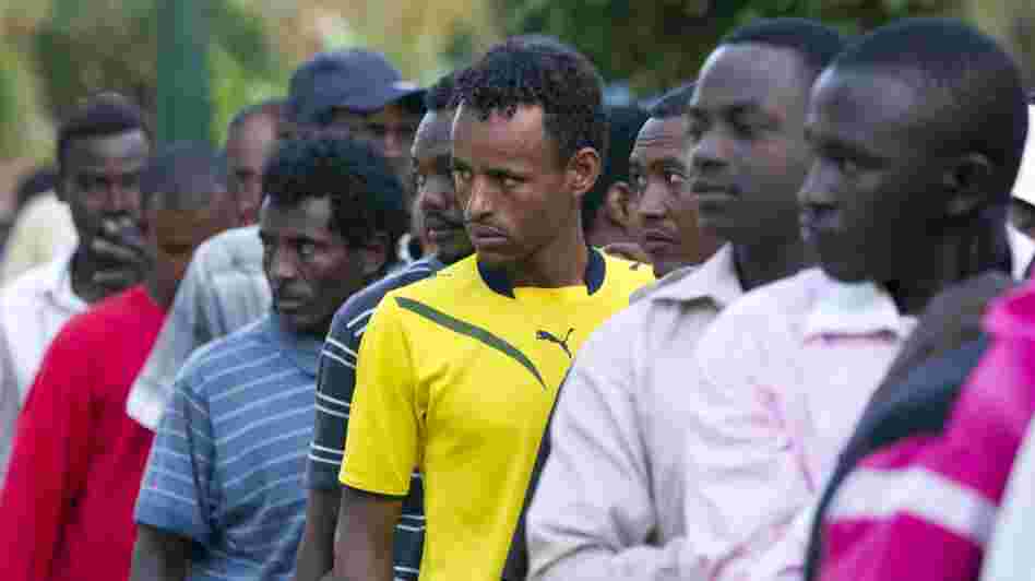 African migrants line up to receive a free hot meal provided by a group of Israelis called Soup Levinsky in Levinsky Park in Tel Aviv on Sunday. A court in Jerusalem ruled that Israel could deport South Sudanese nationals back to their home country. African migrants line up to receive a free hot meal provided by a group of Israelis called Soup Levinsky in Levinsky Park in Tel Aviv on Sunday. A court in Jerusalem ruled that Israel could deport South Sudanese nationals back to their home country.