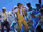 David Alan Grier dazzled audiences last night in "It Ain't Necessarily So," part of a song medley from best musical-revival winner Porgy and Bess.