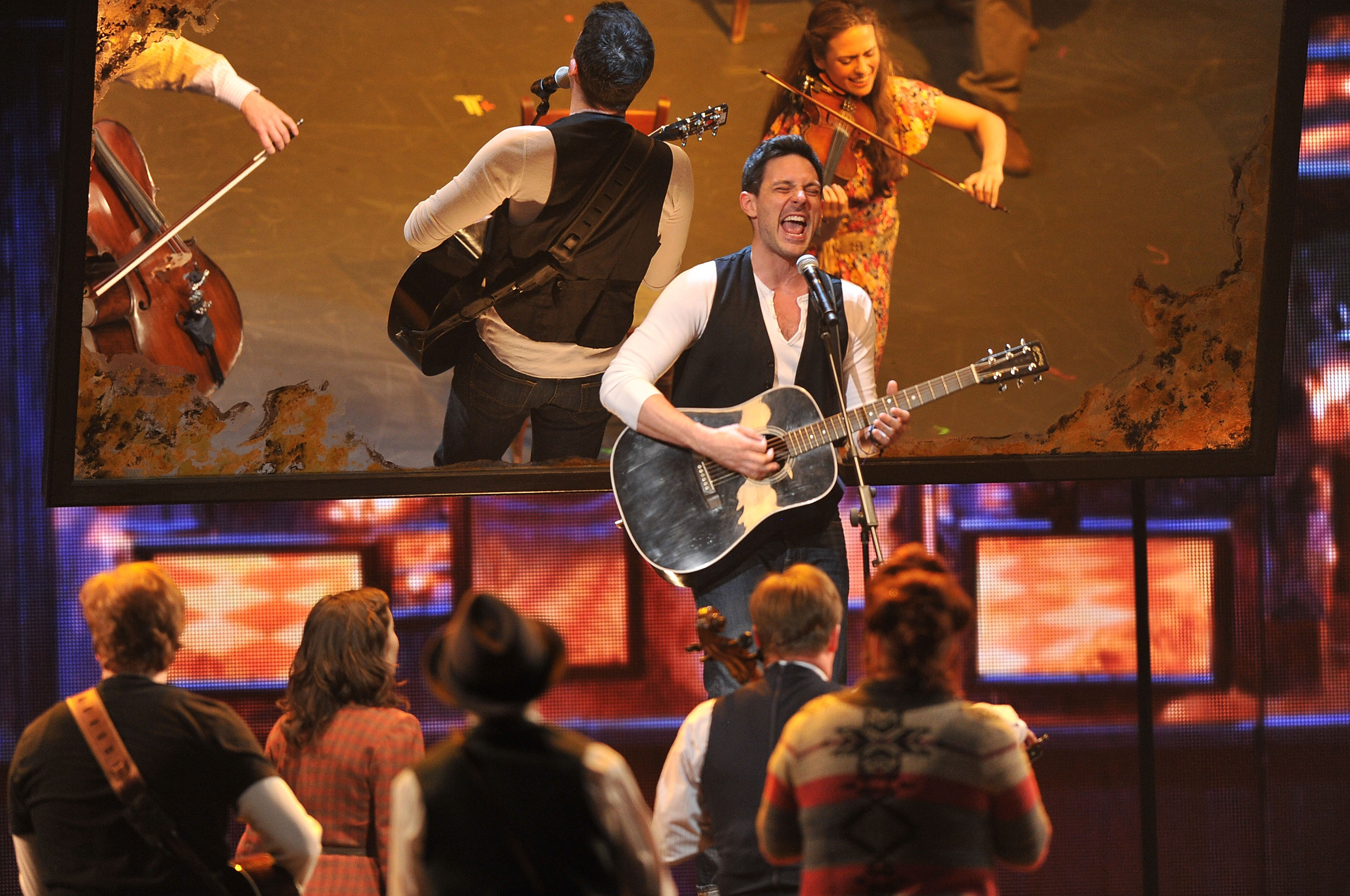New-minted Tony winner Steve Kazee performs with the cast of Once on the awards broadcast.