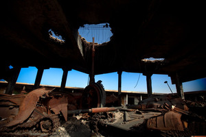 A destroyed building in Misrata holds the damaged remains of tanks that belonged to Moammar Gadhafi's forces.