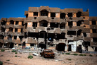 A destroyed apartment building in Tawargha, south of the Libyan coastal city of Misrata. Rebels from Misrata destroyed Tawargha, accusing residents of supporting Moammar Gadhafi and committing atrocities. A destroyed apartment building in Tawargha, south of the Libyan coastal city of Misrata. Rebels from Misrata destroyed Tawargha, accusing residents of supporting Moammar Gadhafi and committing atrocities.