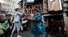 Quintron (at left, in suit and shorts) conducts while Lady Tambourine plays at The Music Box on Saturday night. Quintron (at left, in suit and shorts) conducts while Lady Tambourine plays at The Music Box on Saturday night.