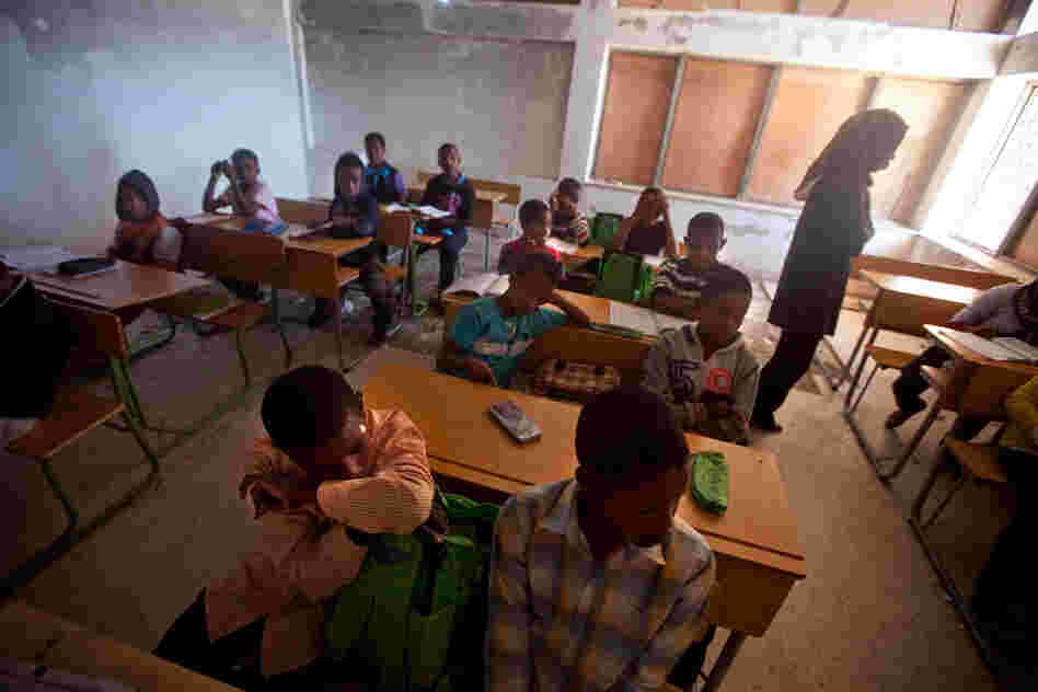 An English class in the Tawargha refugee camp. Students here are studying a new history textbook that makes almost no mention of Gadhafi.