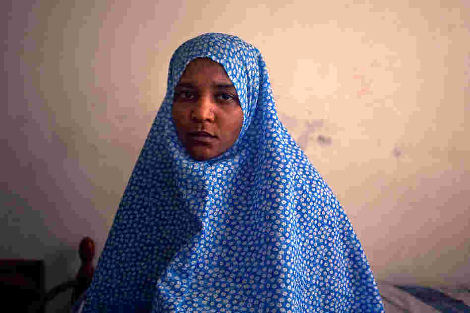 Houda Mohammed Belaid says that when she and her sister joined a protest march against their status as refugees from Tawargha, gunman attacked the protest march and shot them.