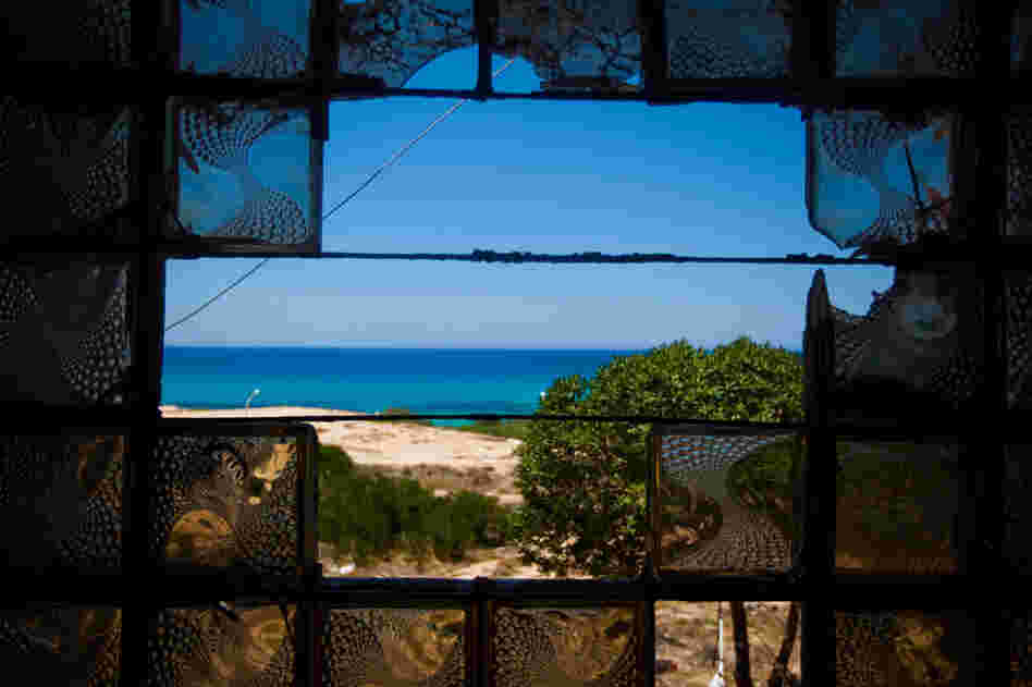 The view out a broken window in the Tawargha refugee camp near Tripoli.