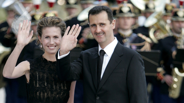 Syrian President Bashar Assad and his wife Asma arrive for a formal dinner after a Mediterranean Summit meeting at the Petit Palais in Paris in 2008.