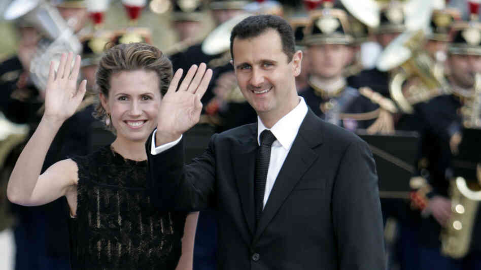 Syrian President Bashar Assad and his wife Asma arrive for a formal dinner after a Mediterranean Summit meeting at the Petit Palais in Paris in 2008.