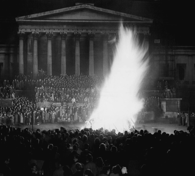 A giant effigy of actor Danny Kaye burns during a peak moment of Guy Fawkes festivities in London, Nov. 5, 1948. Kaye was chosen as the "Guy" by University students, much to the dismay of protesting Variety Artistes Federation. Kaye, cabling from Paris, said "Would have been pleased to start fire myself."
