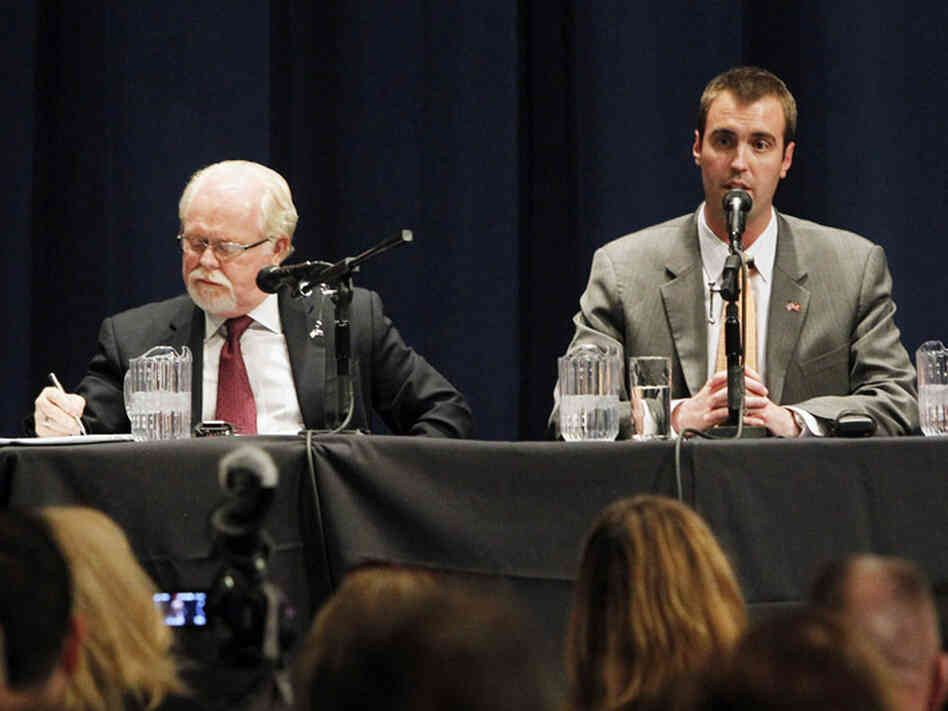 Democrat Ron Barber (left) and Republican Jesse Kelly during a May 23 debate in Tucson. They are running Tuesday in a special election to replace retired Rep. Gabrielle Giffords.