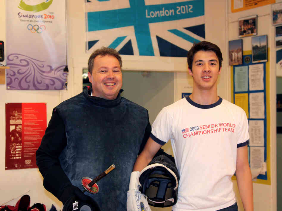 U.S. fencer Alexander Massialas pauses during practice with his father and coach, Greg Massialas.