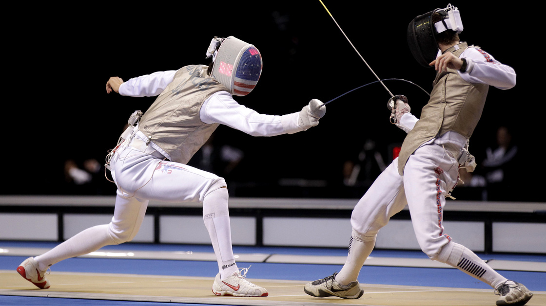Alexander Massialas (left) lands a touch on Britain's Keith Cook during last year's Fencing International Invitation in London.