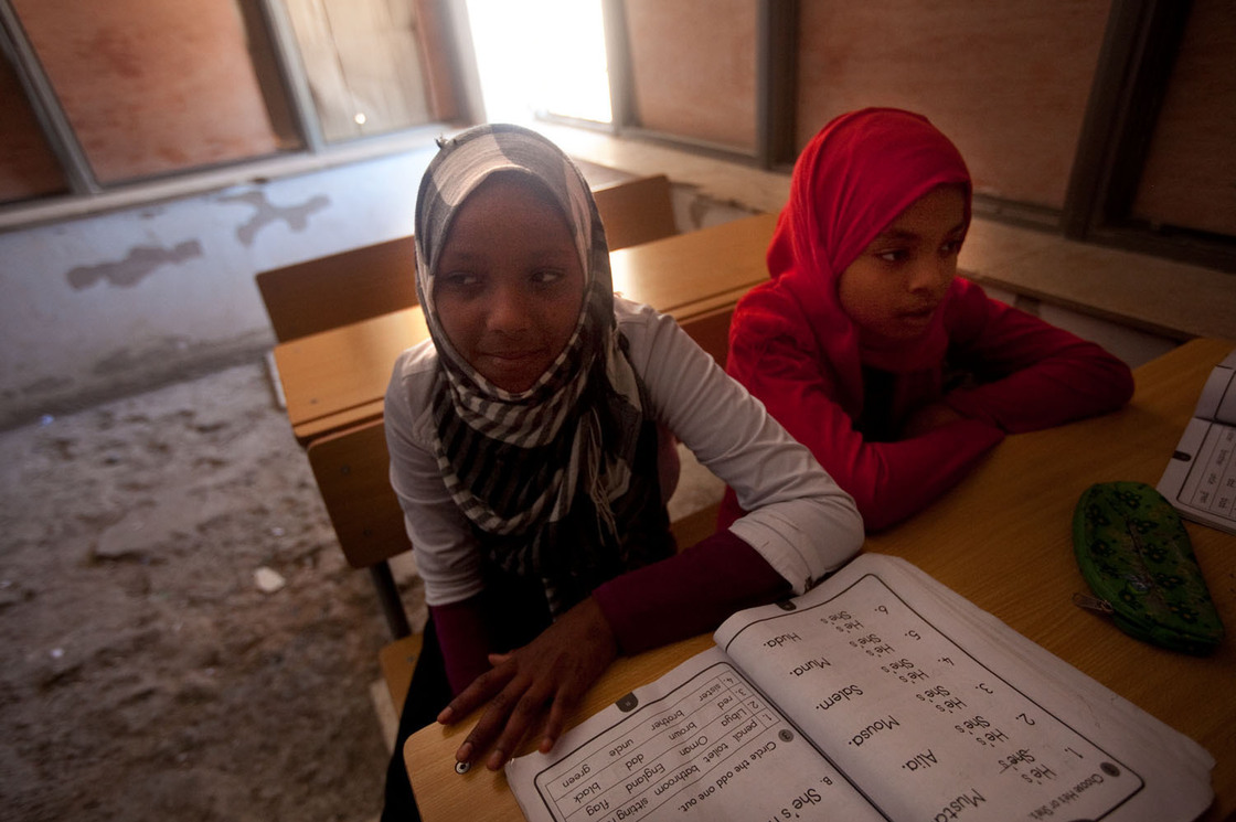 An English class in the Tawargha refugee camp. Students here are studying a new history textbook that makes almost no mention of Gadhafi.