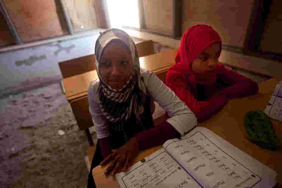 An English class in the Tawargha refugee camp. Students here are studying a new history textbook that makes almost no mention of Gadhafi.