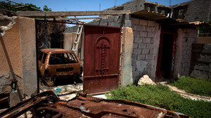 A destroyed home in Tawargha, south of Misrata. Residents have not returned home for fear of death. Misratans have burned every single home in the area and destroyed the town's infrastructure.