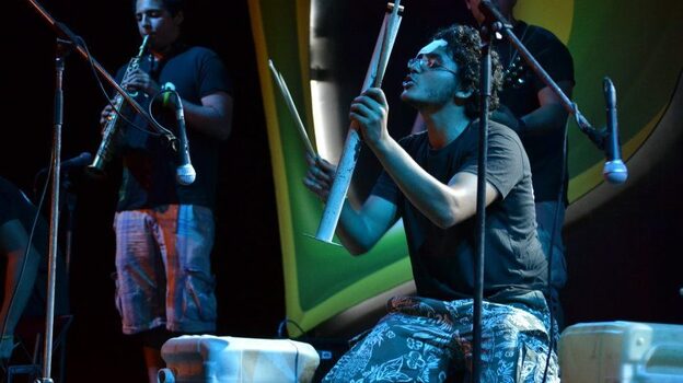 Noor Noor performs with his band El-Zabaleen, which makes many of its instruments out of recycled materials.
