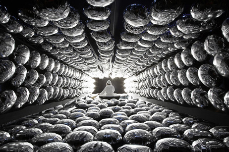 A 2009 London art installation, Super K Sonic Booum, by Nelly Ben Hayoun replicated a neutrino detector, allowing the public to ride in a boat accompanied by the physicists working on the Super-Kamiokande in Japan. A 2009 London art installation, Super K Sonic Booum, by Nelly Ben Hayoun replicated a neutrino detector, allowing the public to ride in a boat accompanied by the physicists working on the Super-Kamiokande in Japan.