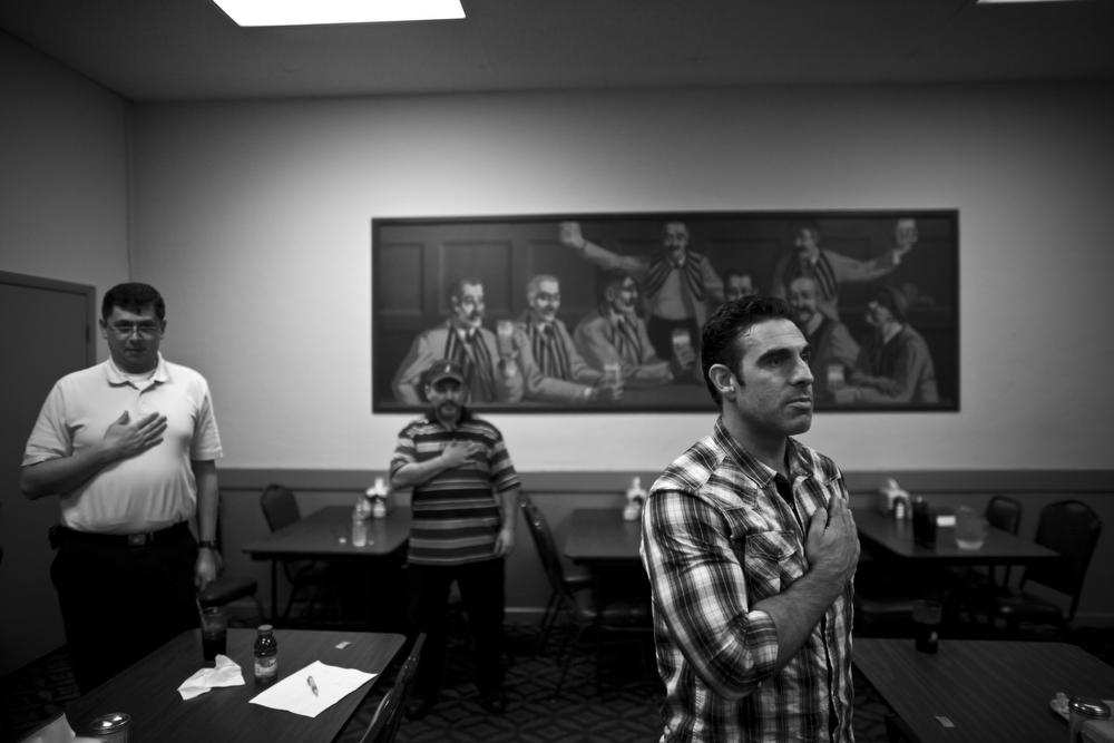 Blake (right) recites the Pledge of Allegiance at the start of a meeting of the Marine Corps Veterans Association in Sacramento, Calif. Blake joined the group to keep in touch with both old and young Marine veterans in the area who support one another.