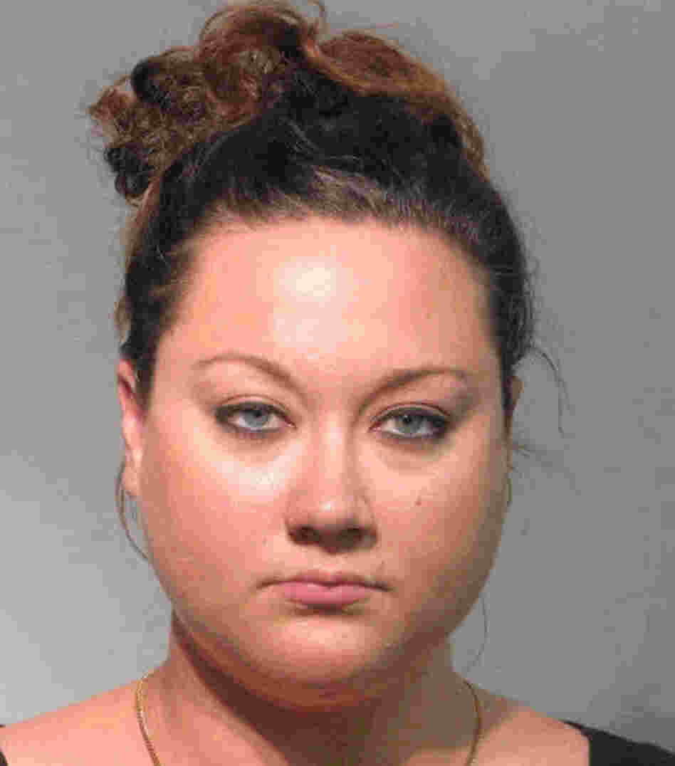 In this handout from the Seminole County Sheriff's Office, Shellie Zimmerman, wife of George Zimmerman, the man accused of shooting Trayvon Martin, is seen in a police mug shot on Tuesday in Sanford, Florida. In this handout from the Seminole County Sheriff's Office, Shellie Zimmerman, wife of George Zimmerman, the man accused of shooting Trayvon Martin, is seen in a police mug shot on Tuesday in Sanford, Florida.