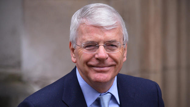 Former British Prime Minister John Major arrives to give evidence at the Leveson Inquiry into media ethics at the High Court in London, on Tuesday.