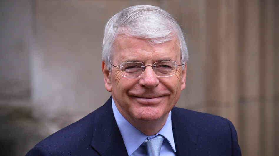 Former British Prime Minister John Major arrives to give evidence at the Leveson Inquiry into media ethics at the High Court in London, on Tuesday.